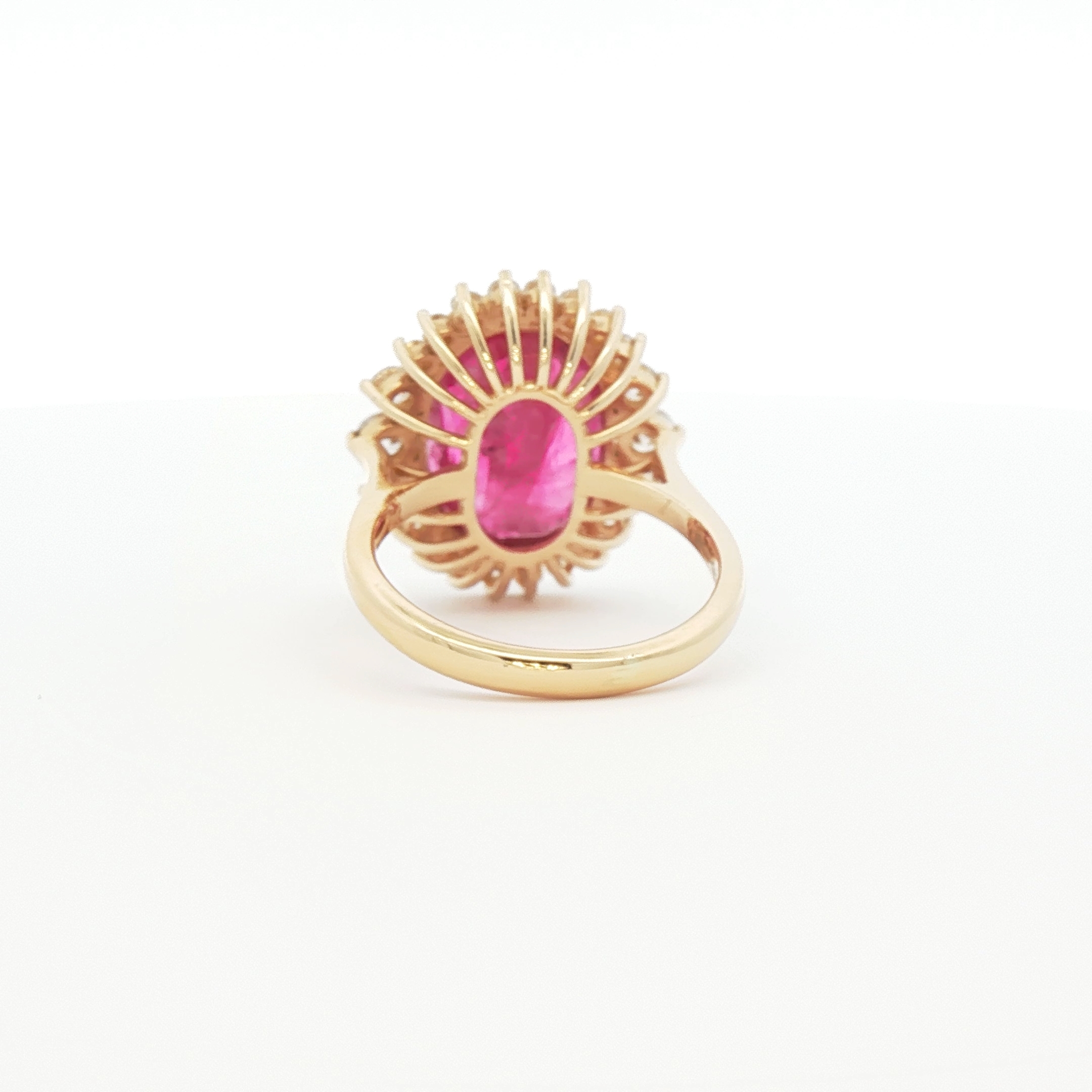 “Magnificent 8.13 carat oval-shaped natural ruby ring with 0.81 carats of diamonds set in 18K gold, untreated No Heat ruby, luxury fine jewelry auction piece.”