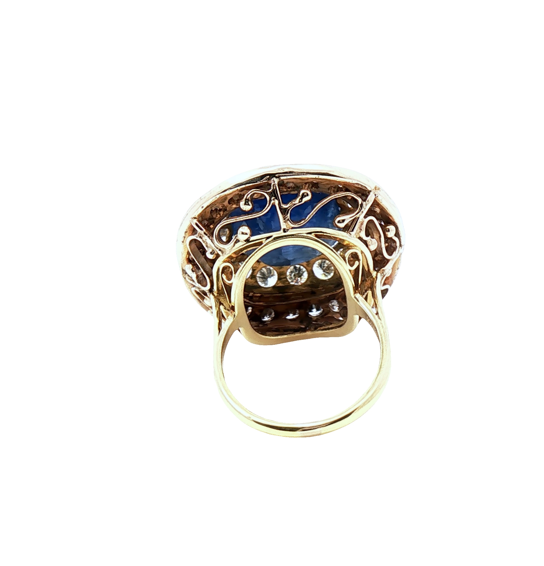 Cushion-cut 19.49 carat no-heat Burmese blue sapphire with diamond accents in 18K yellow gold ring