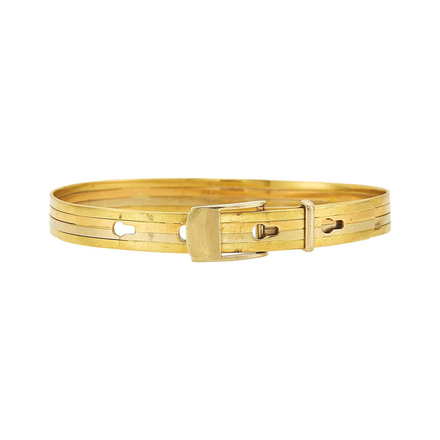 Tricolored 18k gold adjustable bangle bracelet, signed Italy, 5/16-inch wide, inner circumference 6.75–8 inches.
