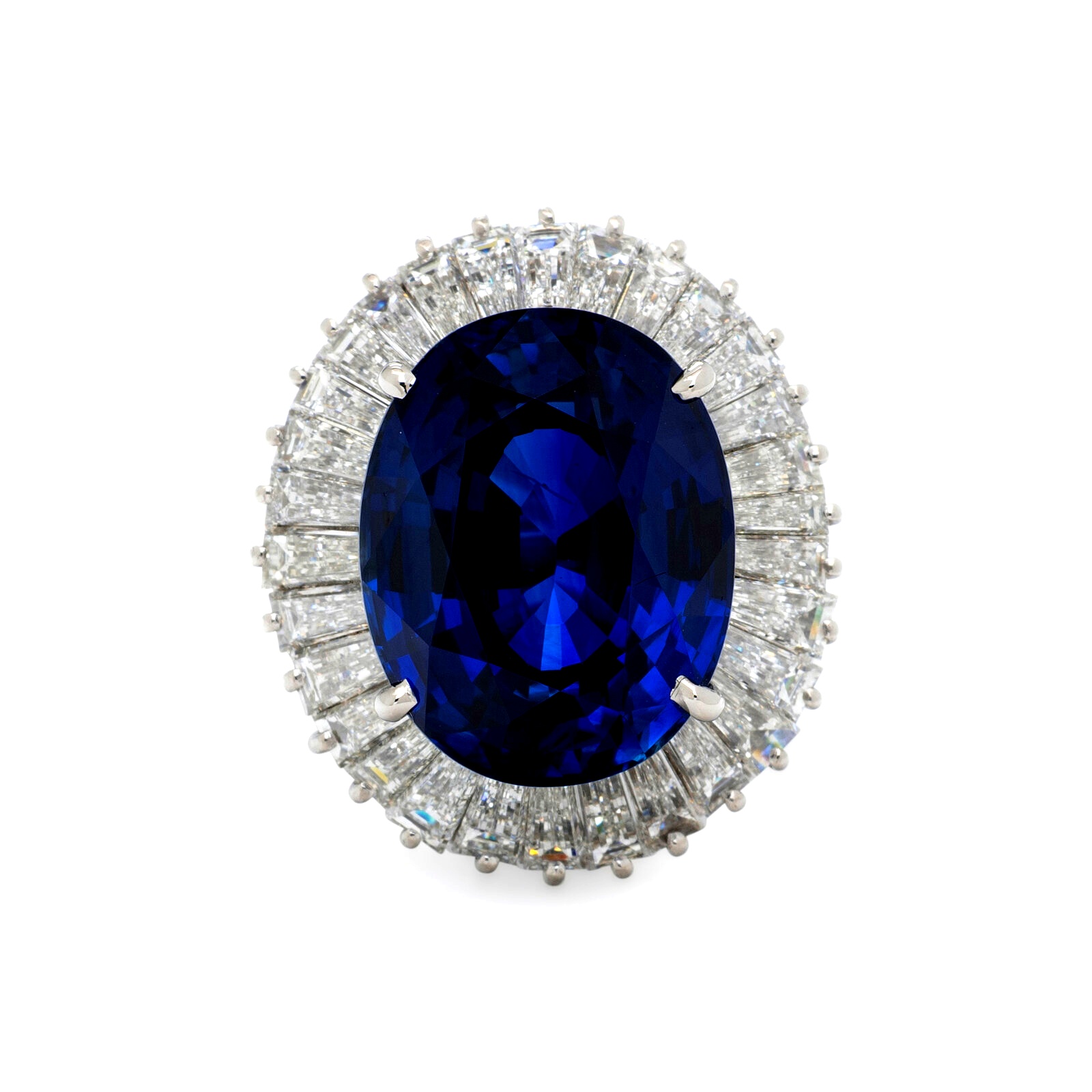 Platinum ballerina ring with ~19.15-carat oval sapphire and tapered baguette-diamond halo; ring size 6; GIA-reported Madagascar origin.