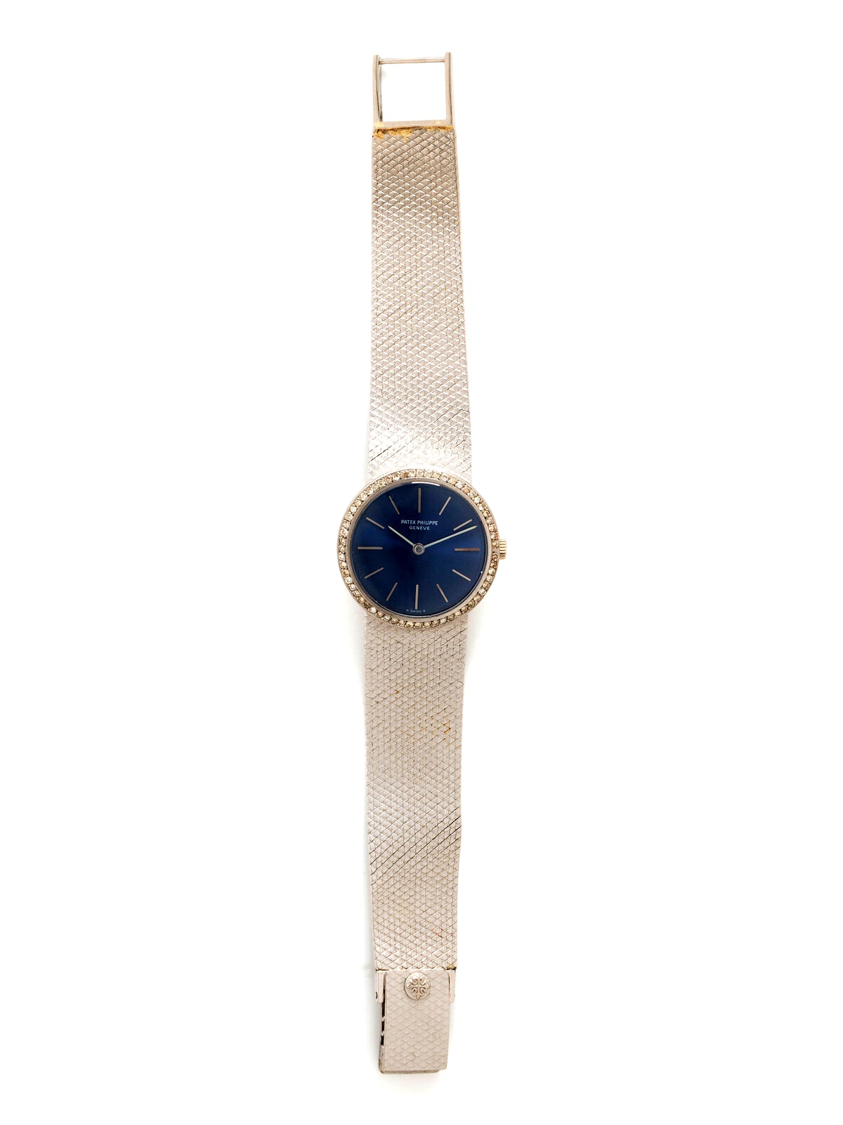 Patek Philippe Ref. 3338/2, 18K white gold jewelry bracelet watch, blue dial, diamond bezel (aftermarket), integrated gold bracelet, circa 1970s.