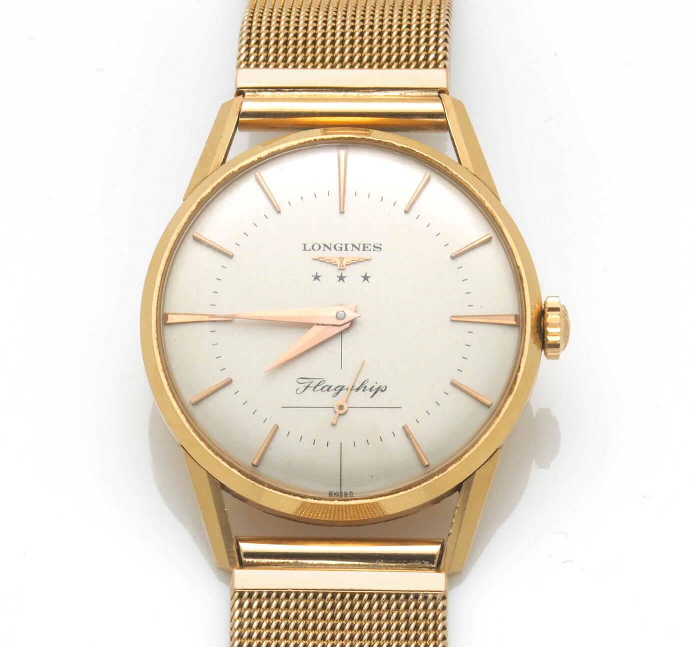 Longines “Flagship” vintage wristwatch in 18K yellow gold, 33 mm case, circular dial with gold baton indexes and hands, on a later bracele