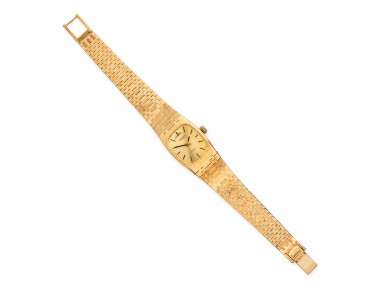 IWC lady’s wristwatch in 18K yellow gold with cushion 20 mm case, champagne dial with baton markers, automatic calibre C.44, integrated textured bracelet, 7 inches