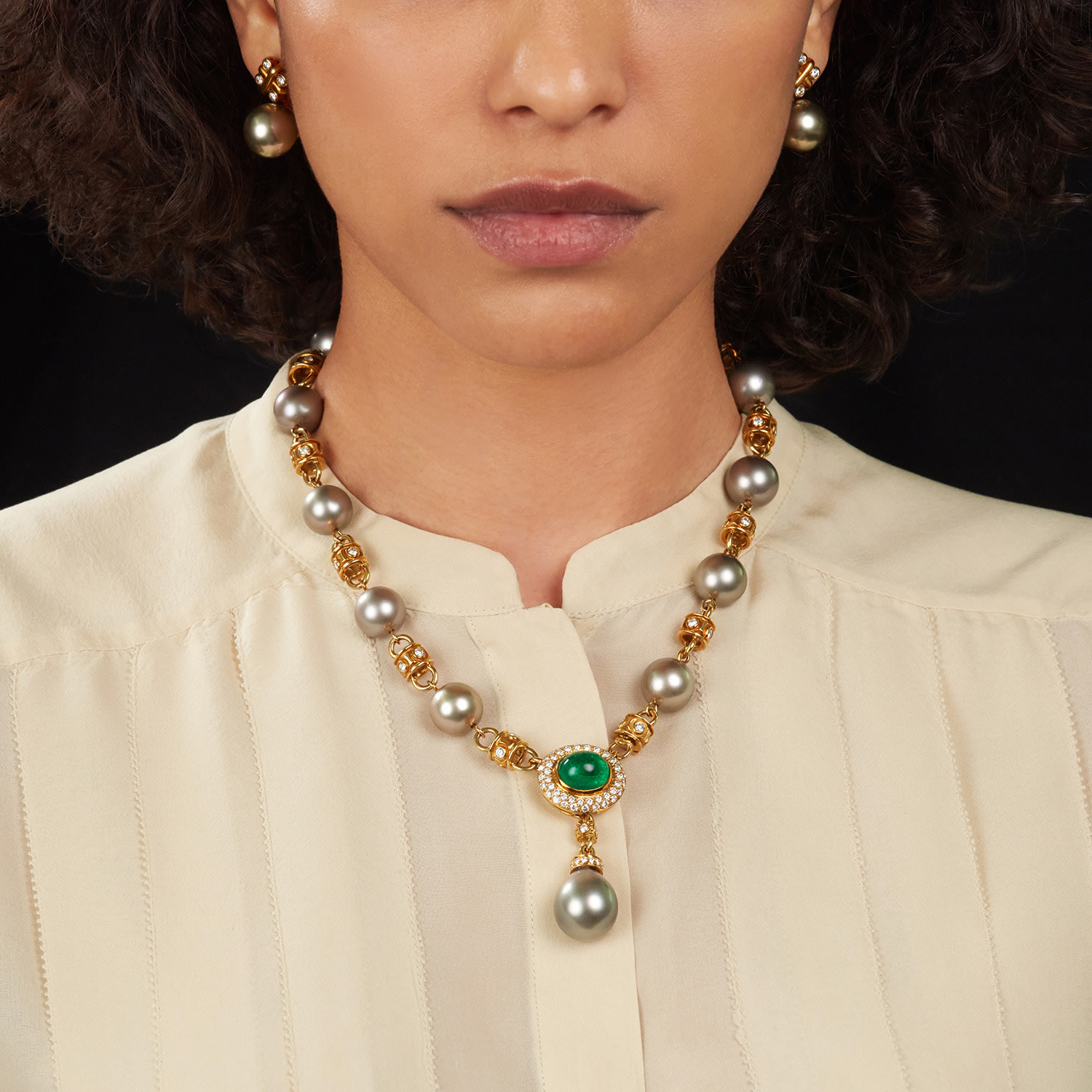 18K yellow gold Tahitian cultured pearl necklace with pavé diamond stations and oval medallion with pearl drop; center mounting customizable, emerald not included