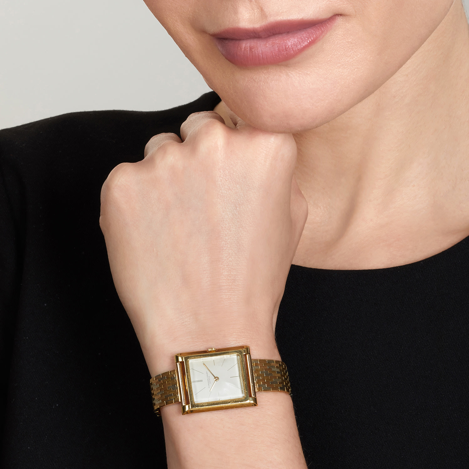 Audemars Piguet manual-wind wristwatch with rectangular 18K yellow-gold case and tri-color (yellow, rose, white) 18K brick-link bracele