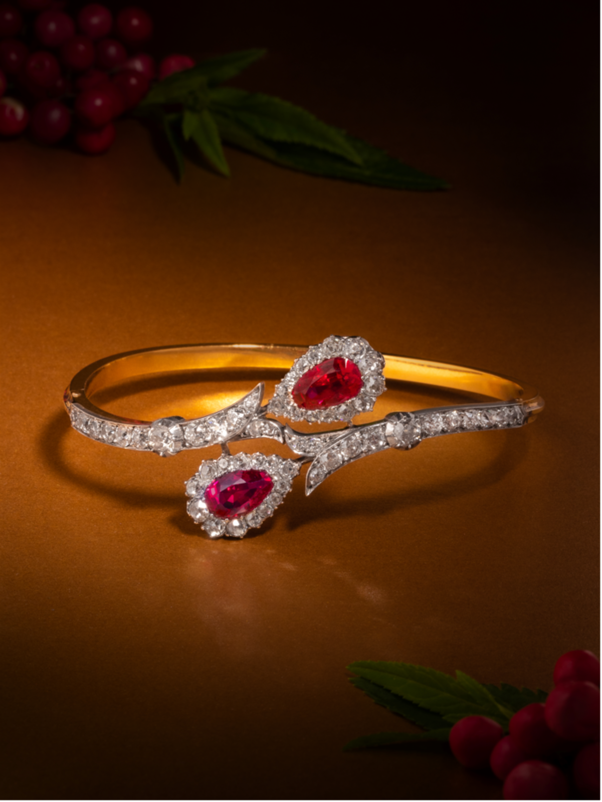 Antique 18th-century bracelet with two pear-shaped no-heat Burmese rubies haloed by old mine-cut diamonds, platinum-topped 18K gold