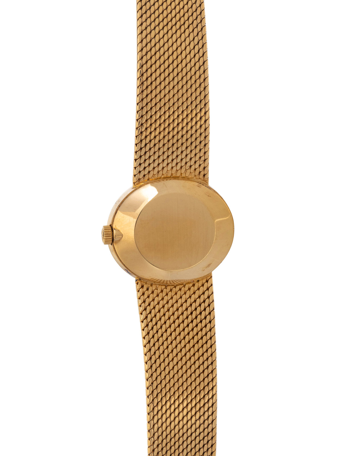 Double-signed Patek Philippe for Tiffany & Co. 18K yellow-gold watch with champagne dial and integrated textured bracelet, manual wind, Swiss hallmarks.