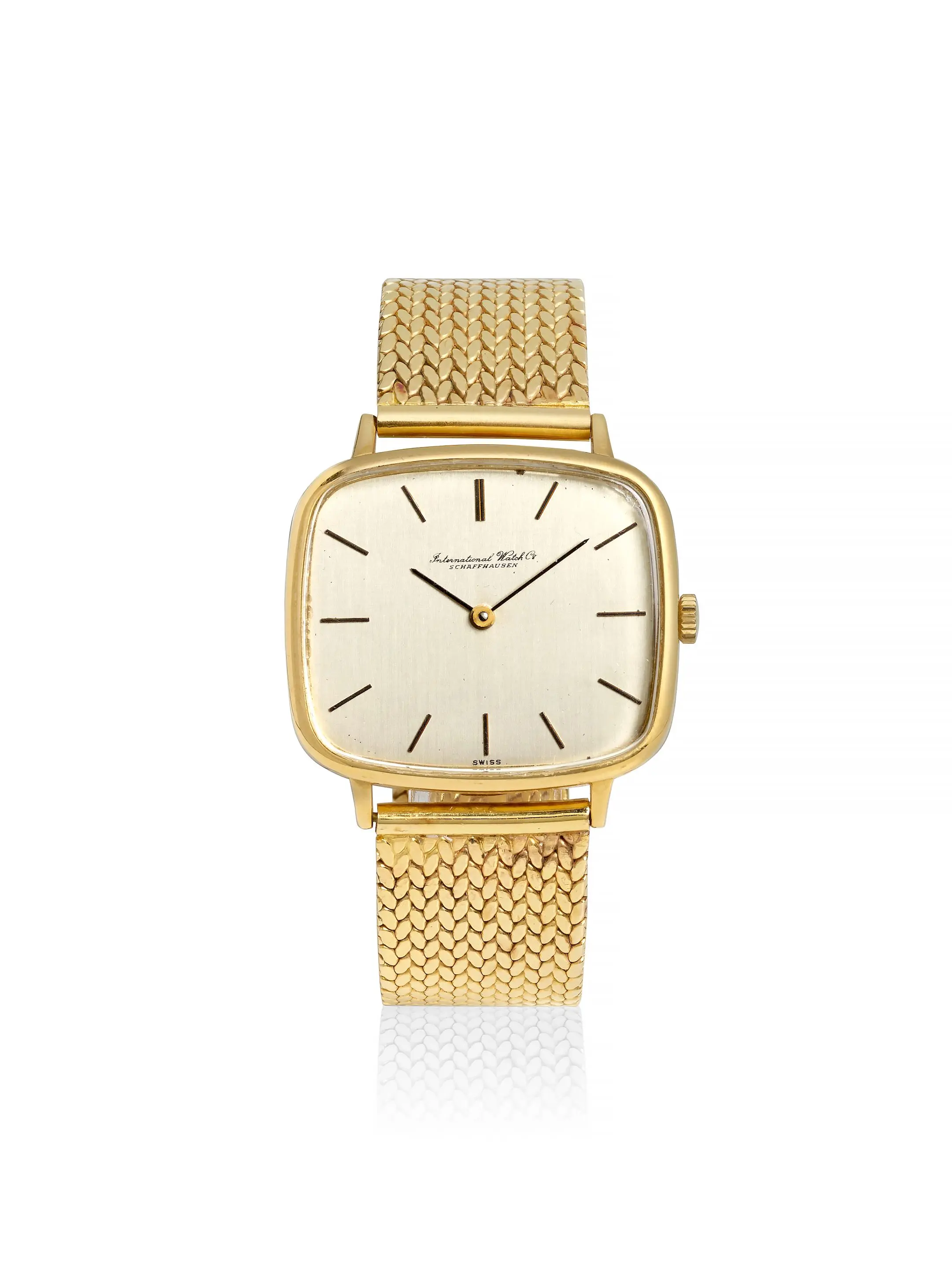 Vintage 1970s IWC Reference 2771 manual wind watch featuring a solid 18K gold case, a refined dial, and an integrated 14K gold bracelet.