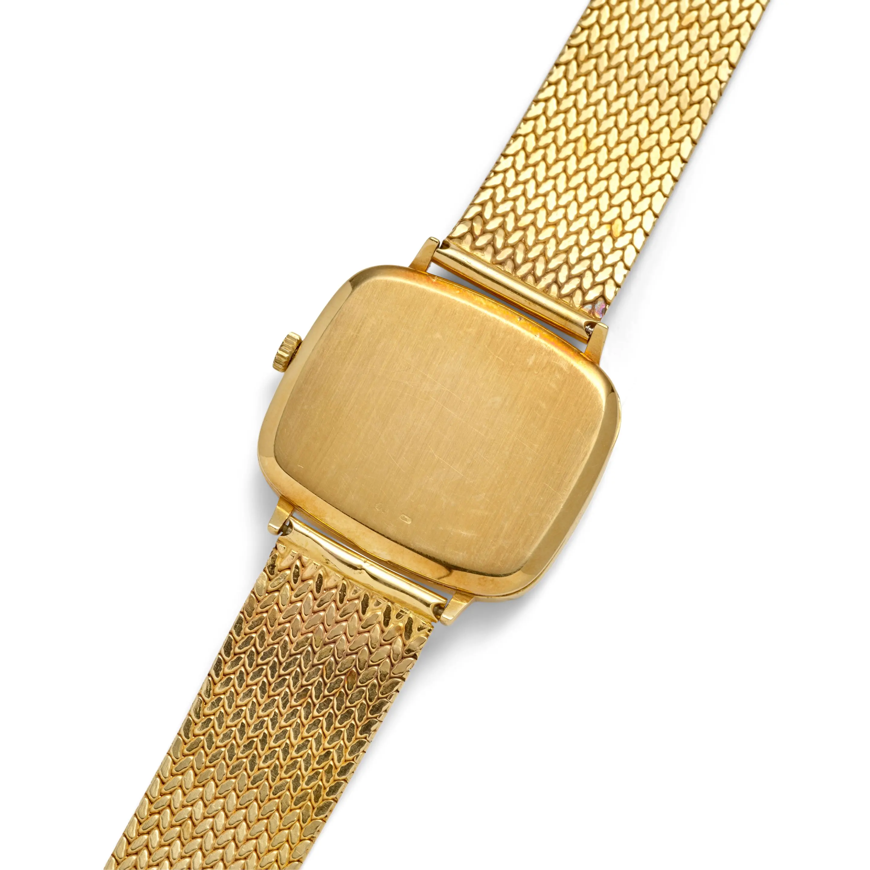 Vintage 1970s IWC Reference 2771 manual wind watch featuring a solid 18K gold case, a refined dial, and an integrated 14K gold bracelet.