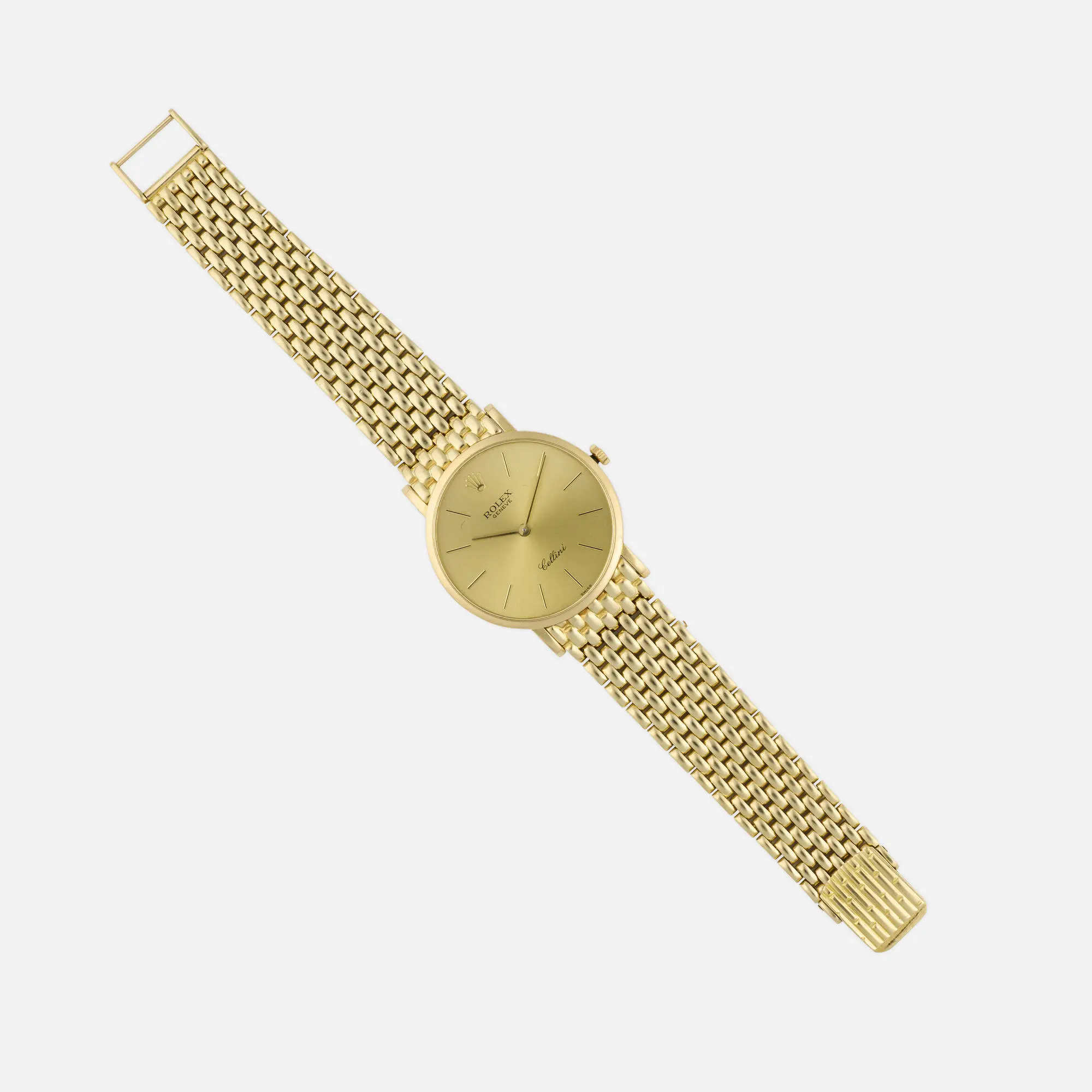 Vintage Rolex Cellini Ref. 5112 solid 18k yellow gold manual-wind 32mm dress watch with gold baton dial, integrated gold bracelet, original box, and guarantee papers.