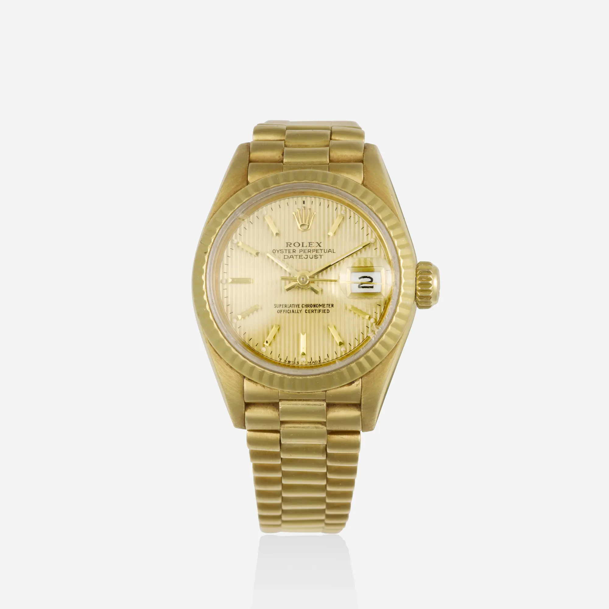 Vintage circa 1987 Rolex Lady-Datejust Reference 69178 solid 18k yellow gold 26mm automatic wristwatch with gold dial and President bracelet with deployant clasp.