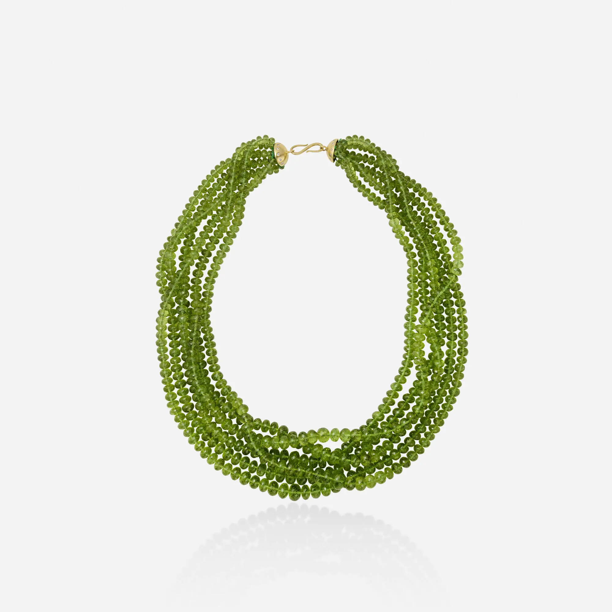 High-luxury six-strand faceted green peridot bead necklace with an 18k yellow gold hook clasp capped with round brilliant-cut diamonds.