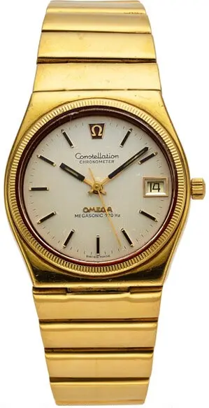 1972 vintage 18k solid gold Omega Constellation Ref. 398.0819 with silver dial and integrated 18k gold link bracelet.