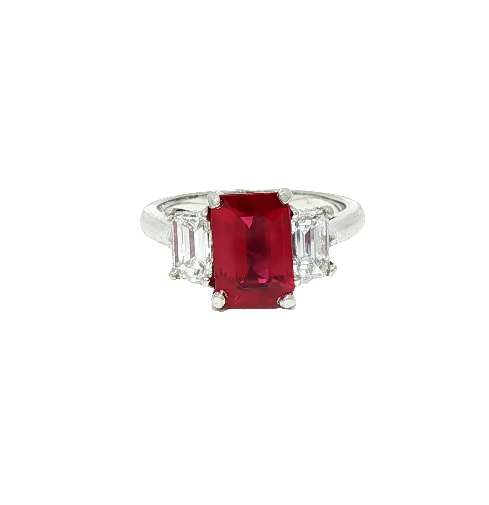 High-jewelry platinum ring featuring a 2.02-carat Burmese emerald-cut ruby with diamond accents, Sotheby’s Christie’s auction style