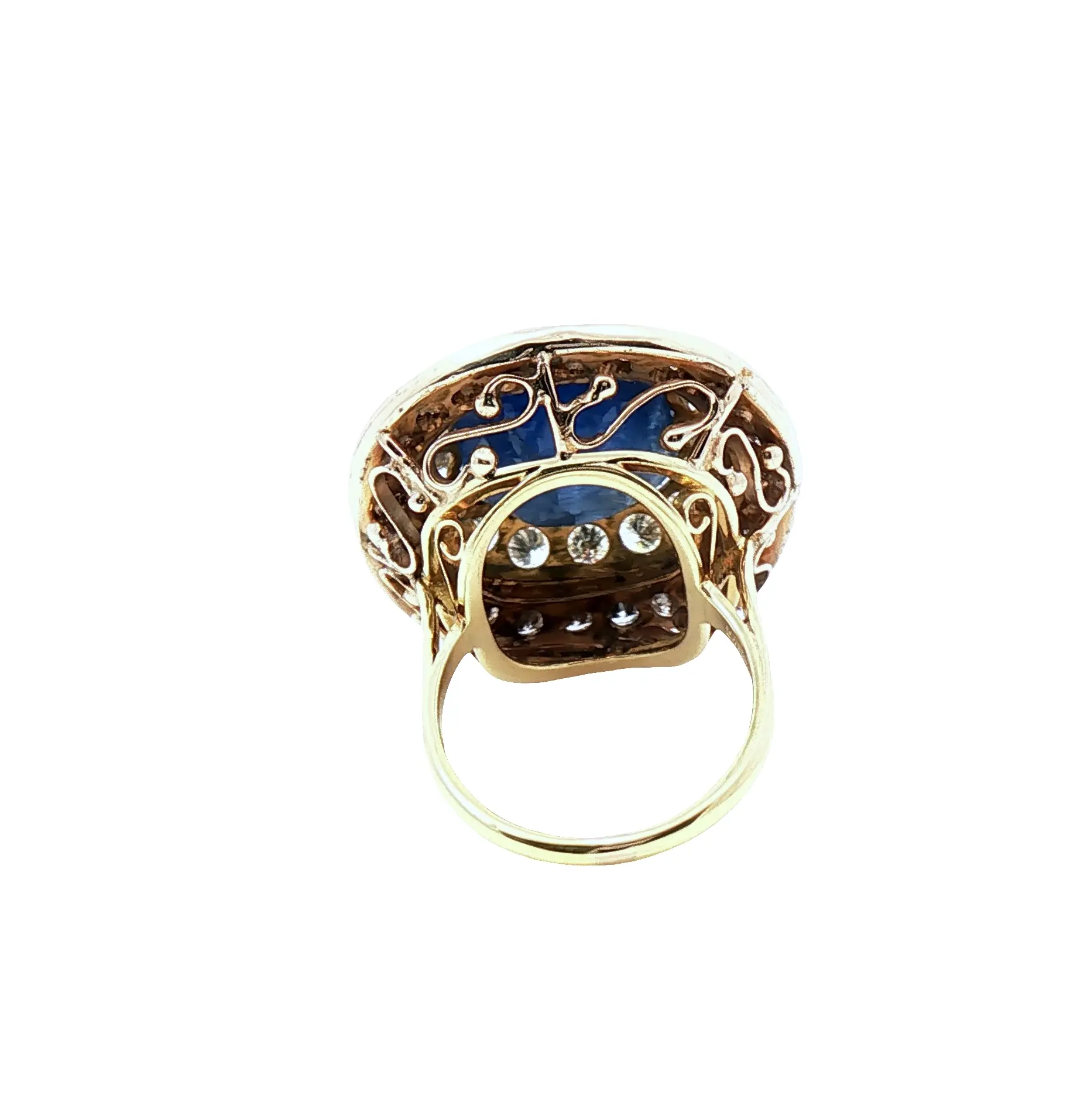 Cushion-cut 19.49 carat no-heat Burmese blue sapphire with diamond accents in 18K yellow gold ring