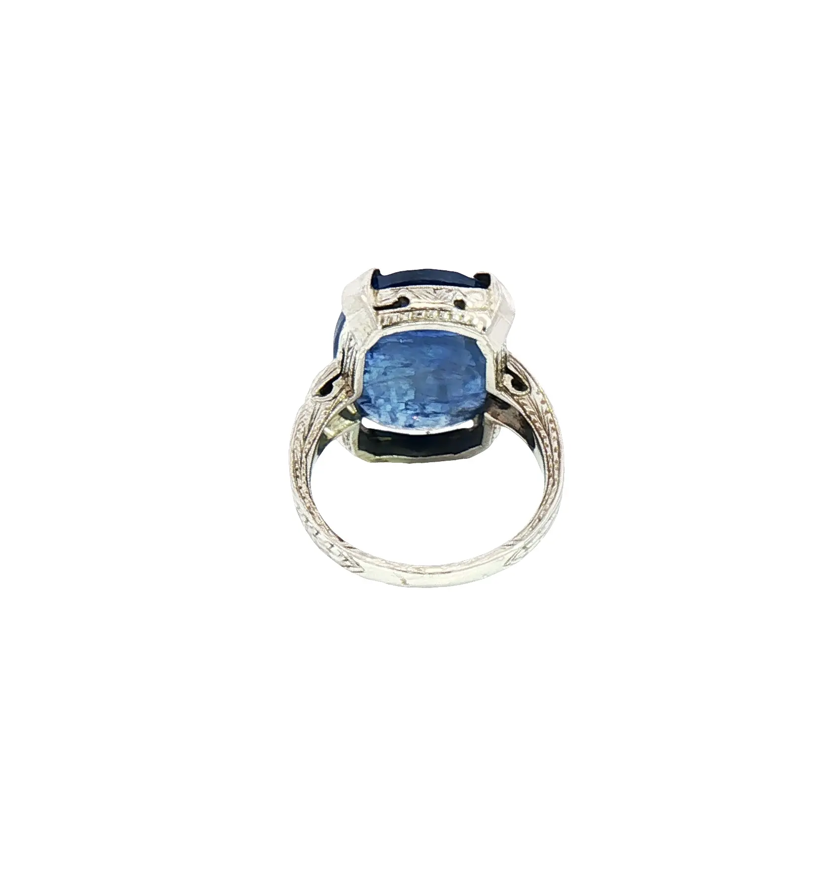 Cushion-shaped 9.00 carat no-heat Burmese blue sapphire, rose-cut, set in 18K white gold with diamond accents