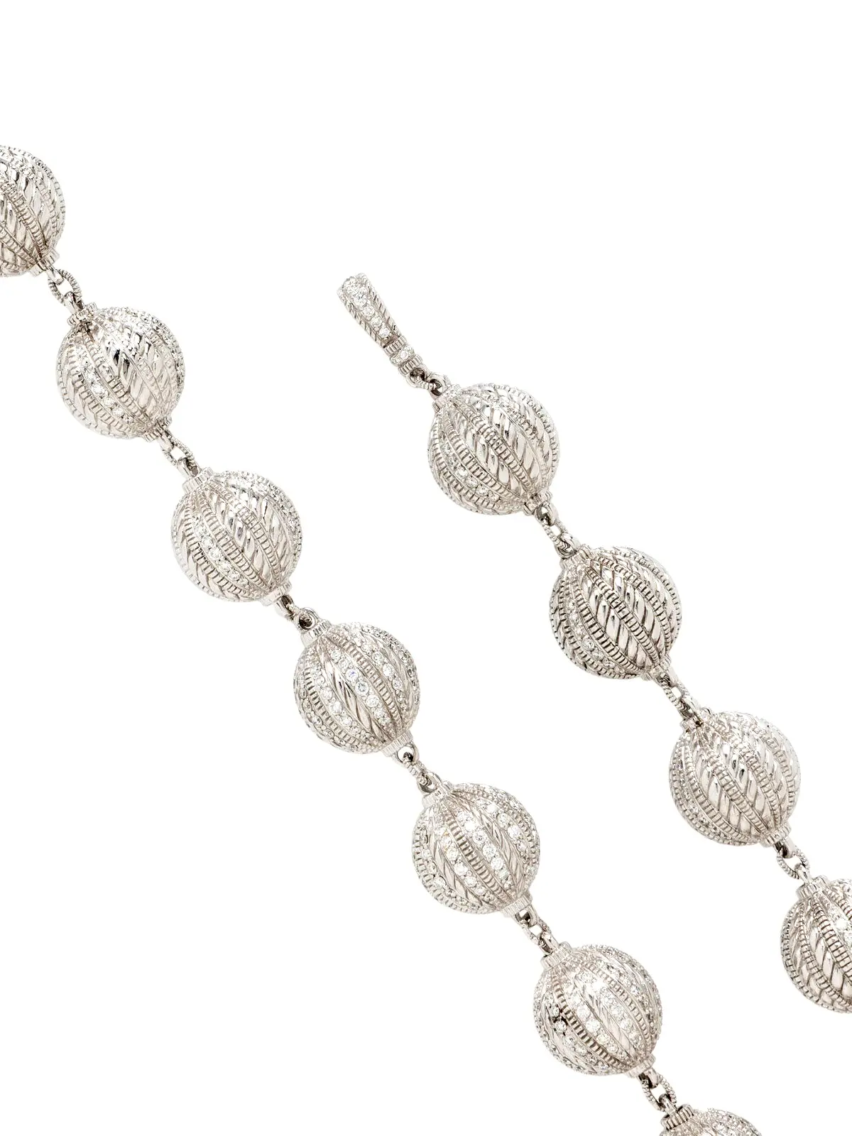 Judith Ripka 18K white gold diamond truffle-ball necklace with textured pavé spheres, approx. 18 inches long and 16 mm wide.