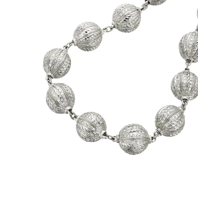 Judith Ripka 18K white gold diamond truffle-ball necklace with textured pavé spheres, approx. 18 inches long and 16 mm wide.