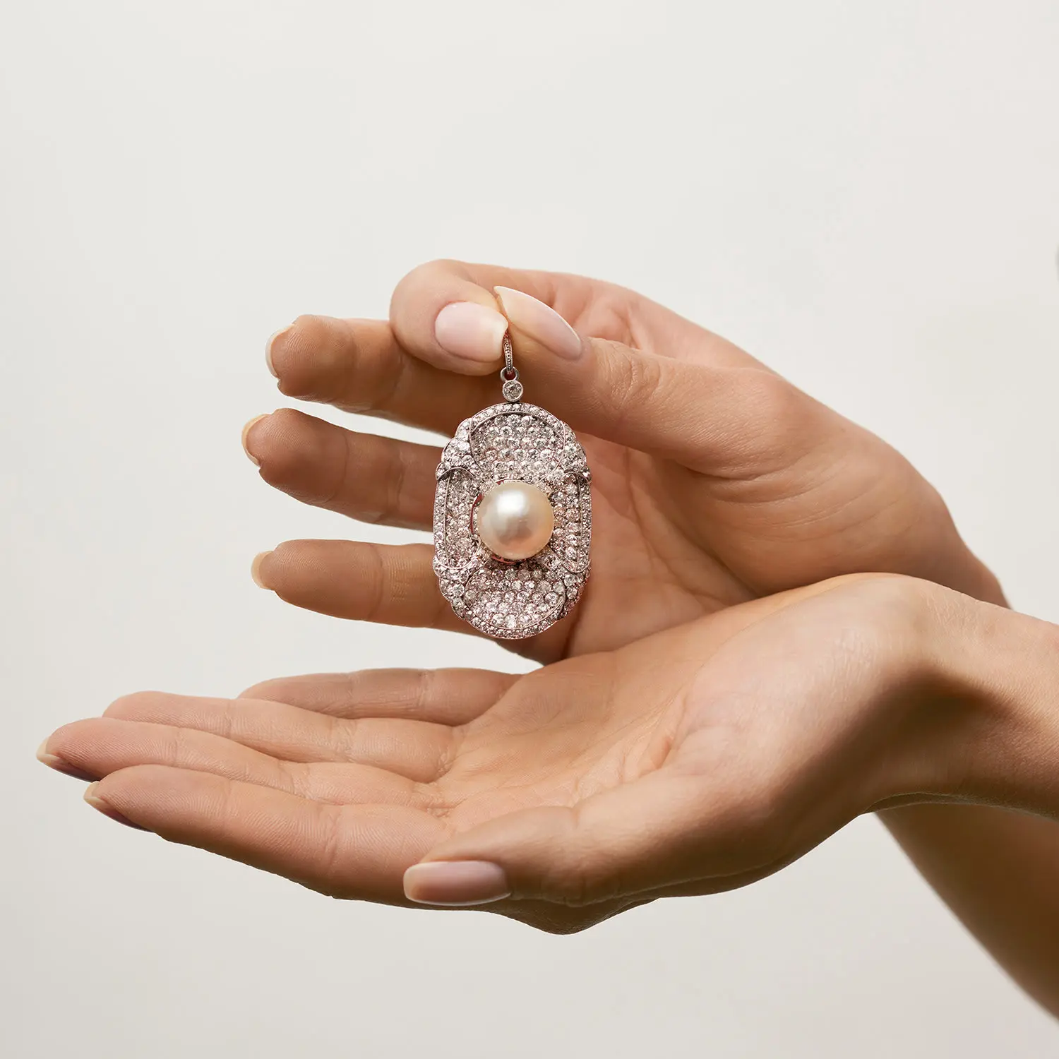 Natural saltwater pearl and diamond platinum pendant, button pearl with old European-cut diamonds