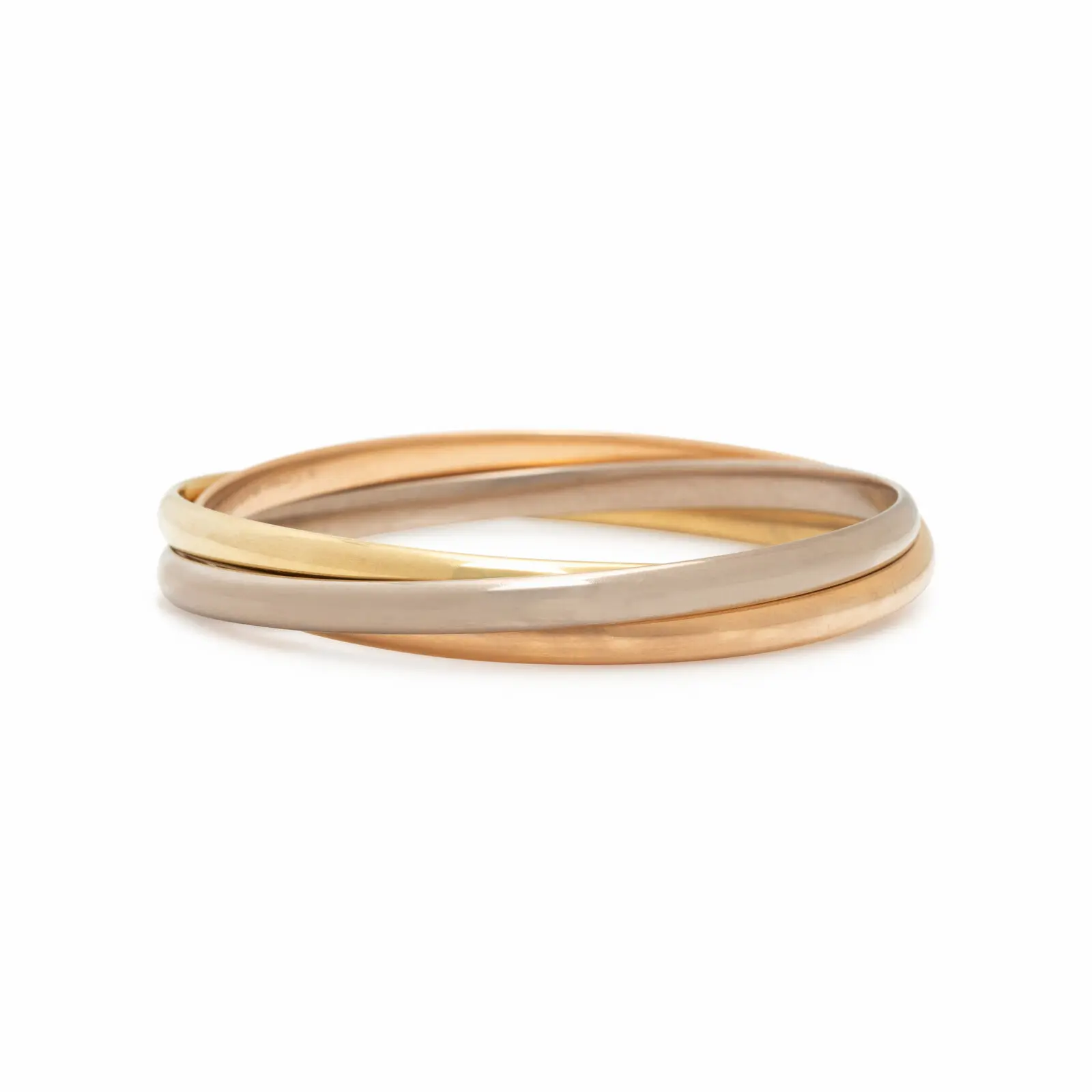 cartier_trinity_bangle_tricolor_18k_front.jpg — “Cartier ‘Trinity’ tri-color 18K gold bangle