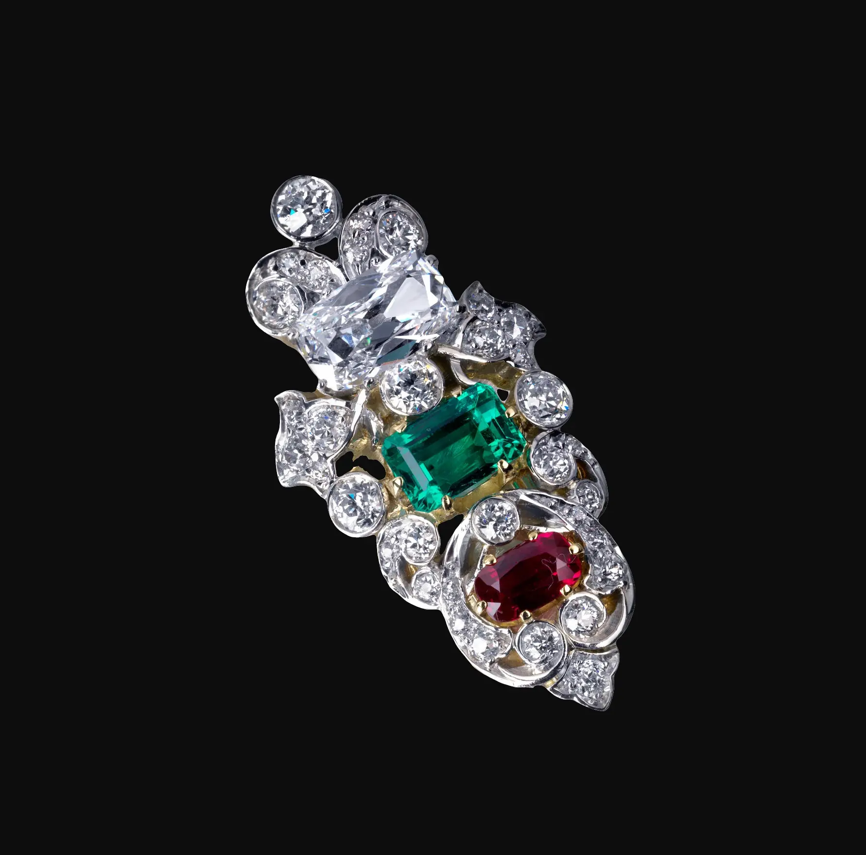 Belle Époque platinum and 14K gold brooch with 1.39 ct D/VS1 old mine-cut diamond, ~1.50 ct Colombian emerald, ~0.60 ct Burmese ruby, c.1900, pavé old European-cut diamonds.