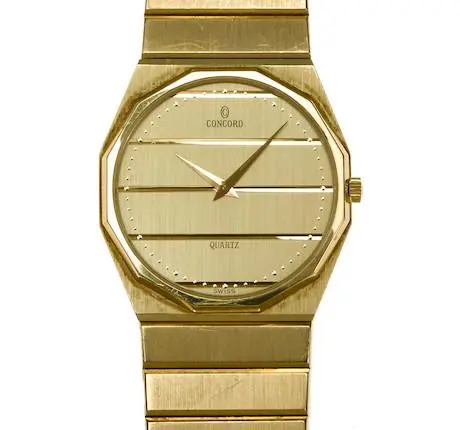 Concord Mariner quartz 31mm bracelet wristwatch in solid 14K yellow gold with integrated bracelet, signed on dial, case, and movement.