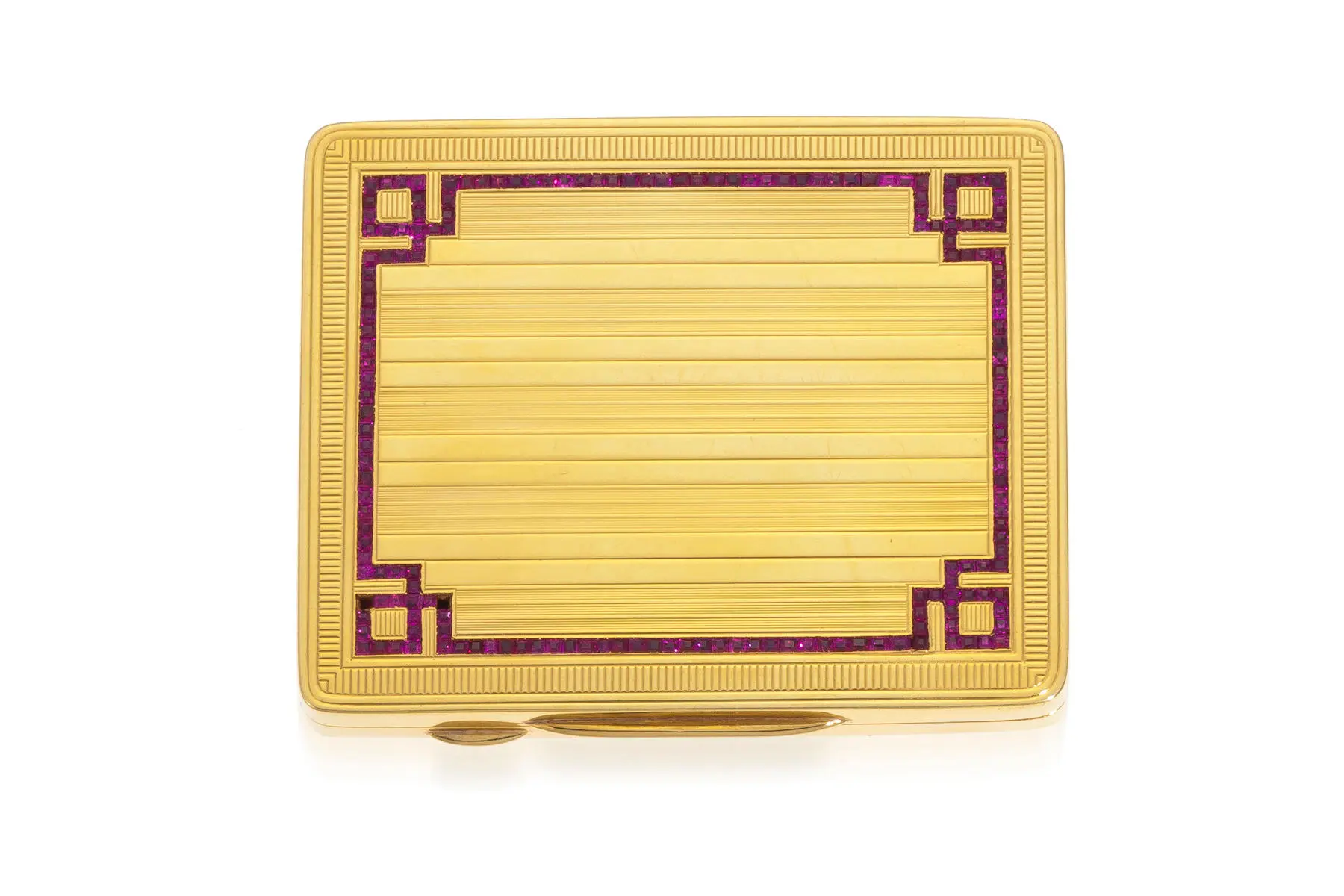 An antique rectangular 18k gold compact from circa 1910