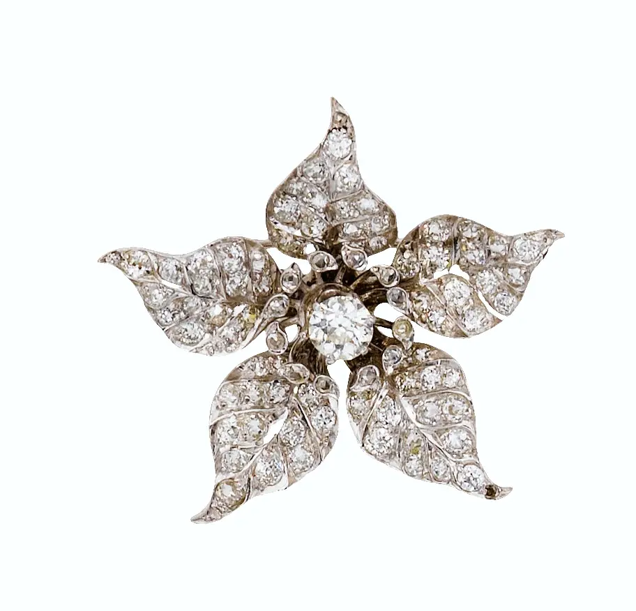 Diamond floral brooch with central old European-cut diamond, rose-cut halo, and pavé-set petals of old mine and old European-cut diamonds