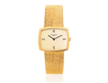 Patek Philippe ref 3528/1 gentleman’s 18K gold cushion-case manual-wind wristwatch on tapering gold bracelet, worn on wrist, circa 1965, with original box